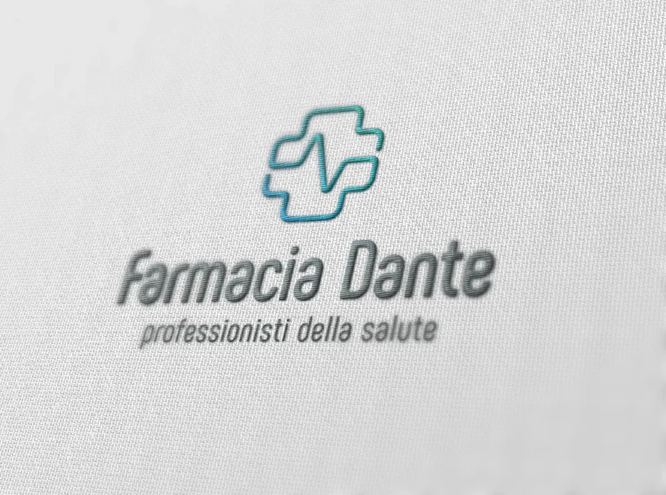 Il marchio Farmacia Dante ricamato su un tessuto bianco